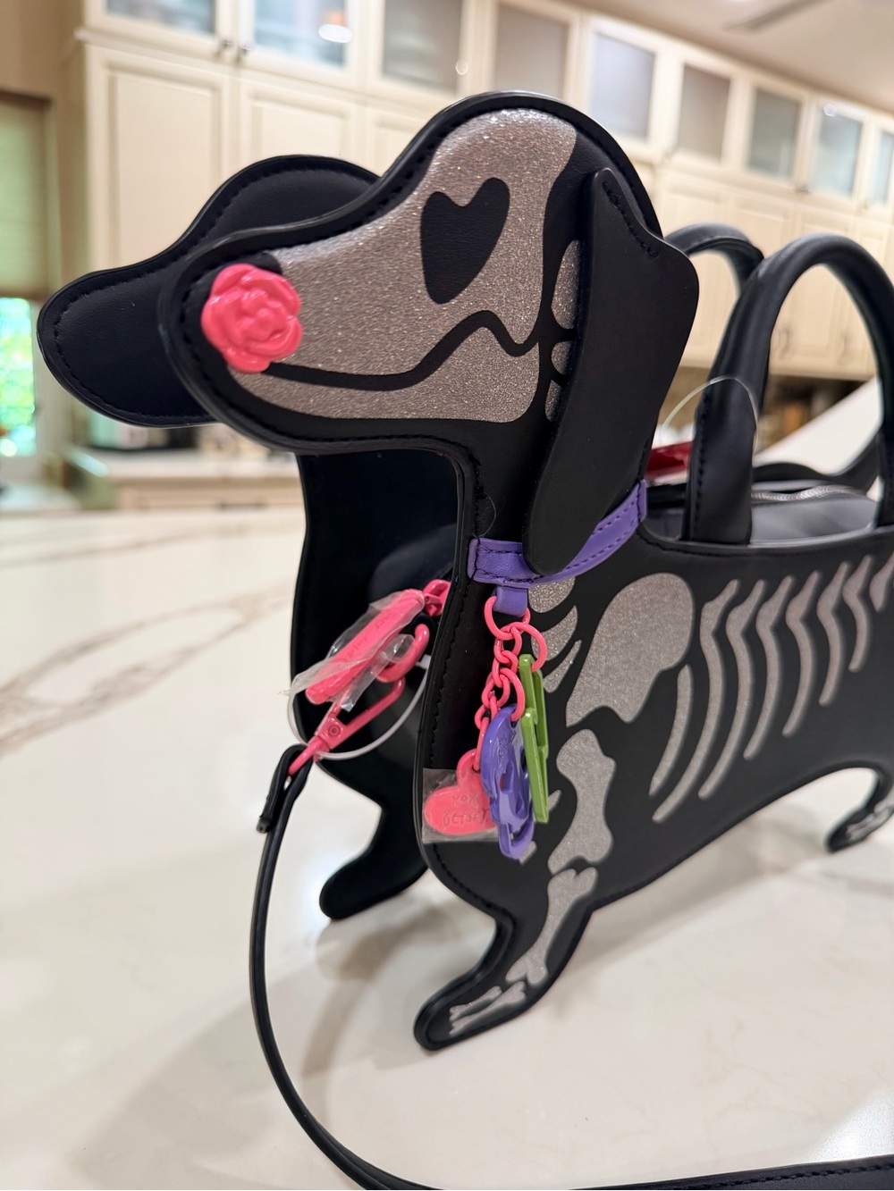 Betsey Johnson Black Dachshund Skeleton Crossbody Bag with Pink & Purple Accents - Picture 2 of 8